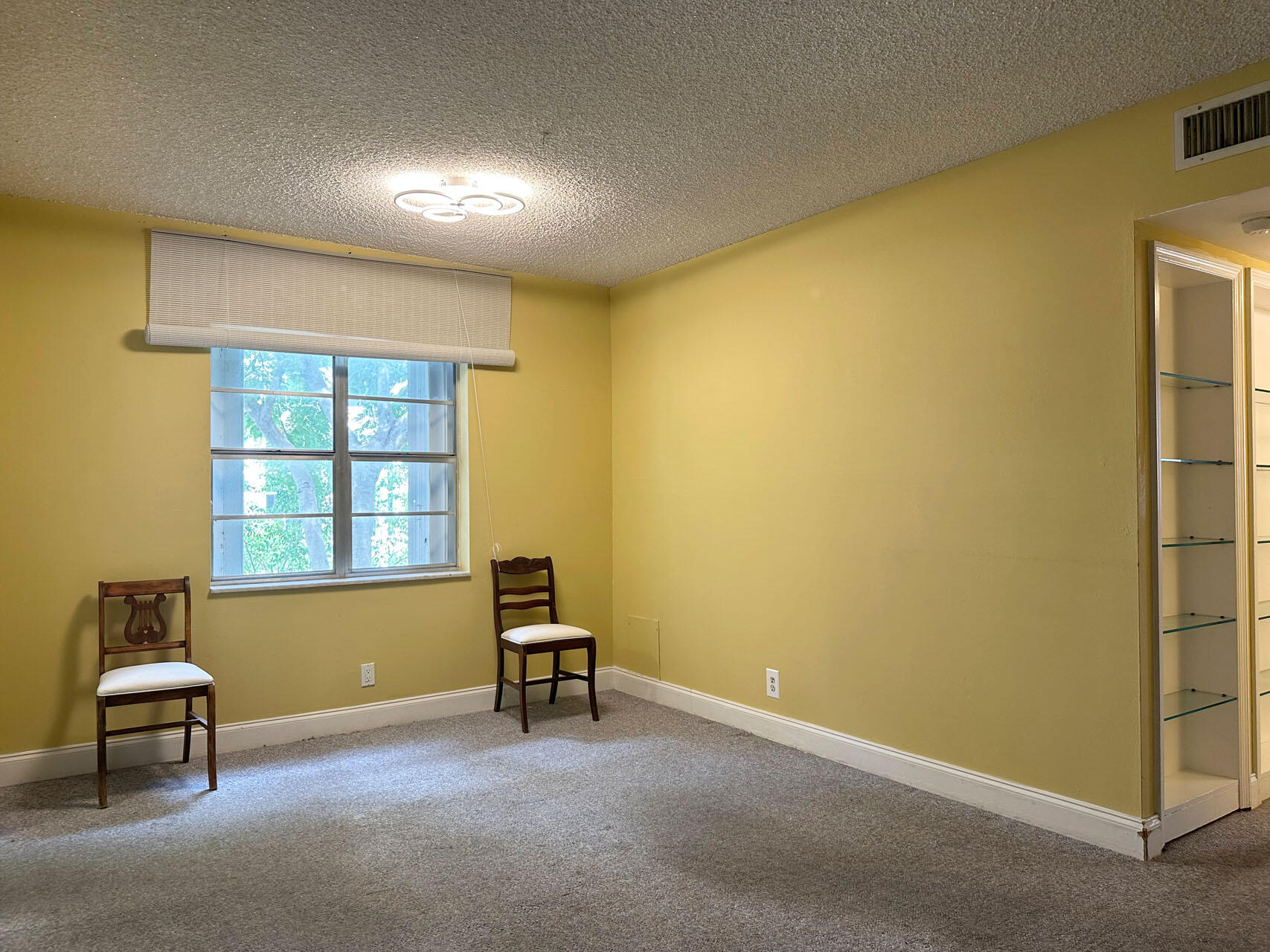 100 Royal Palm Way, Unit 2010 Boca Raton, FL 33432 - Photo 10 of 31 a living room with furniture and a window