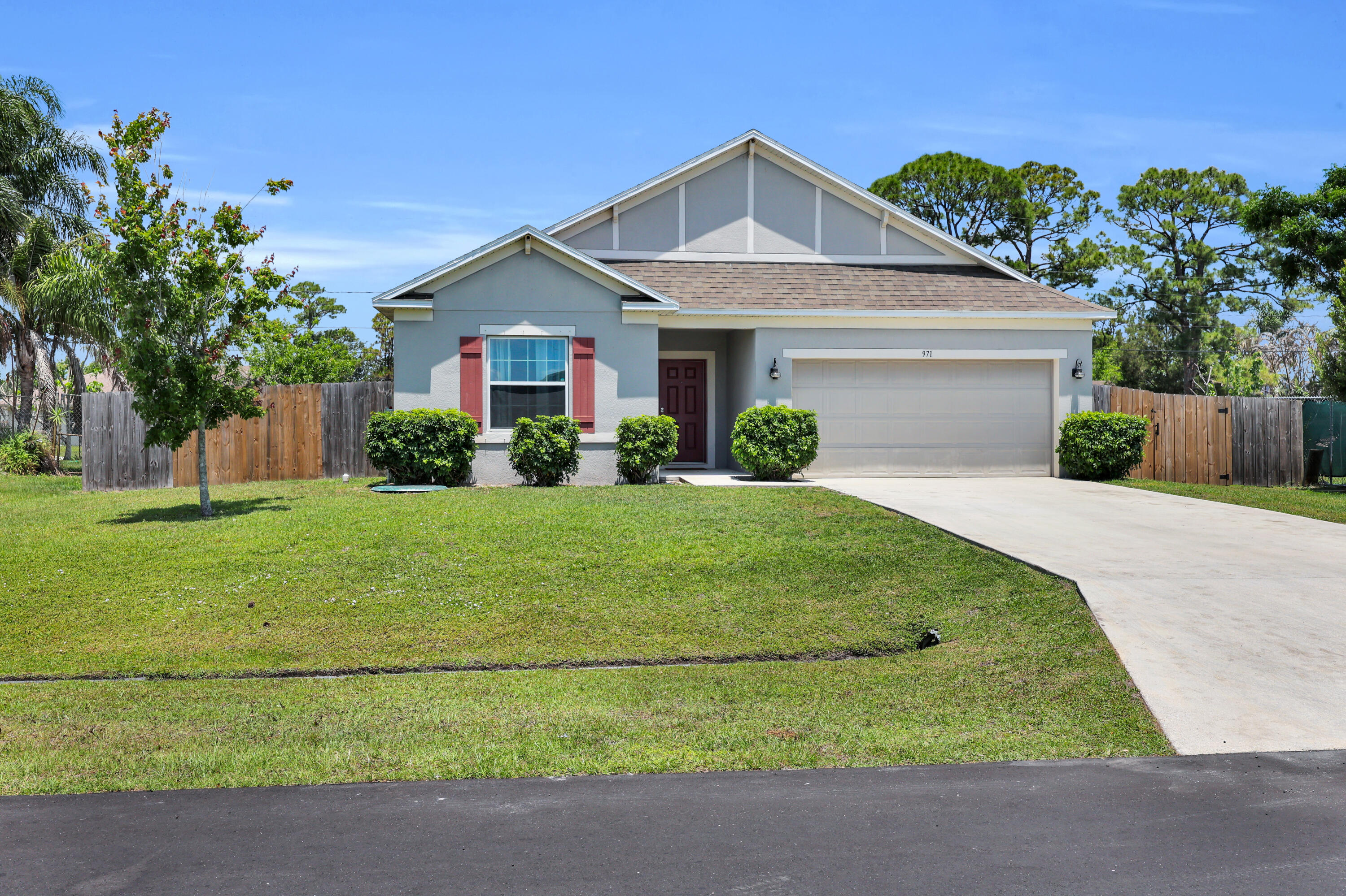 971 Southwest Longfellow Road Port St. Lucie, FL 34953 - Photo 1 of 38 8P3A7674