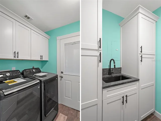 a utility room with washer and dryer