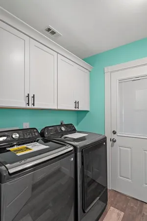a close view of a sink and dishwasher in a kitchen