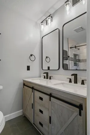 en empty room with window and flowerpot