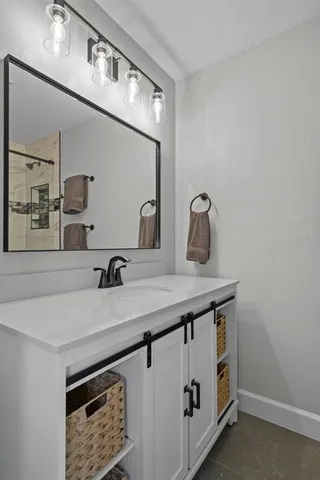 a bathroom with a shower and bathtub