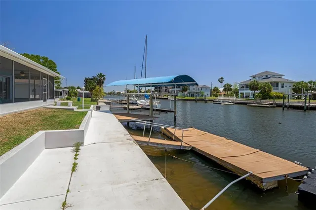 an aerial view of a house with a ocean view