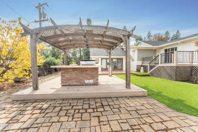 a view of a backyard with a garden and plants