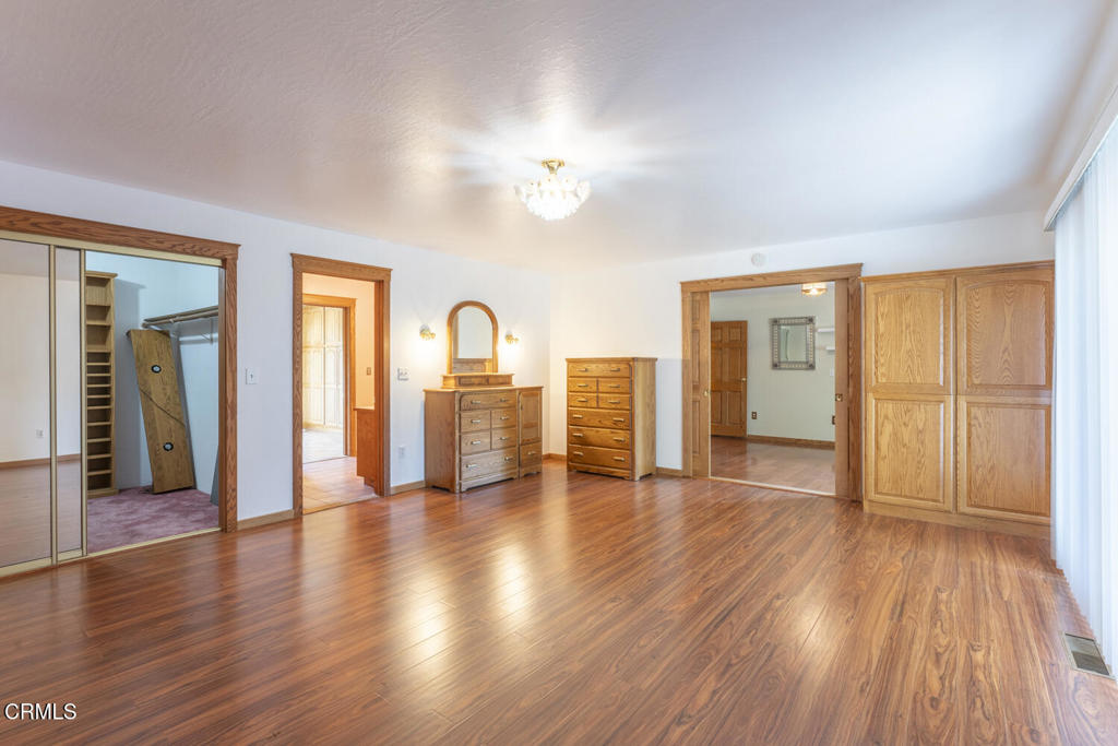 1840 Branscomb Road Laytonville, CA 95454 - Photo 7 of 26 a view of a livingroom with wooden floor