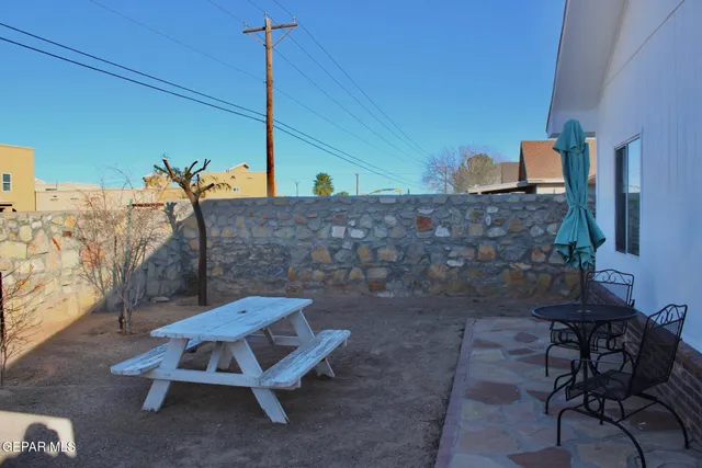 a view of a terrace with chairs