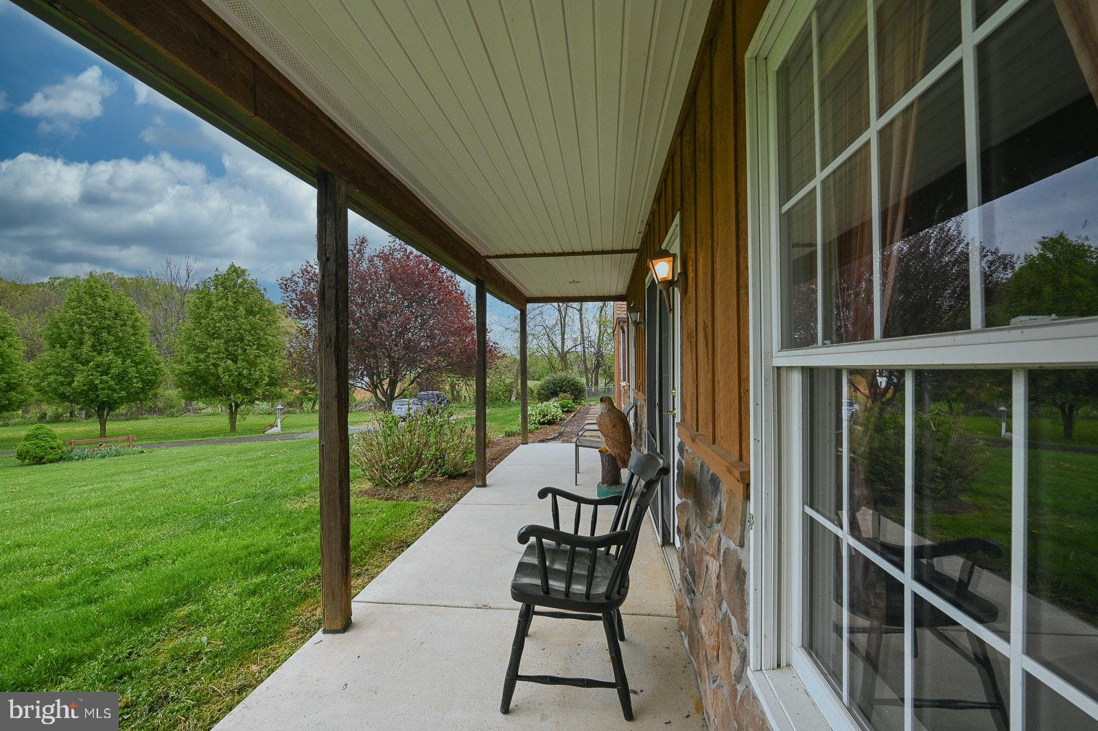 2074 Flowing Springs Road Chester Springs, PA 19425 - Photo 19 of 62 Relax on the fron porch and take in the views