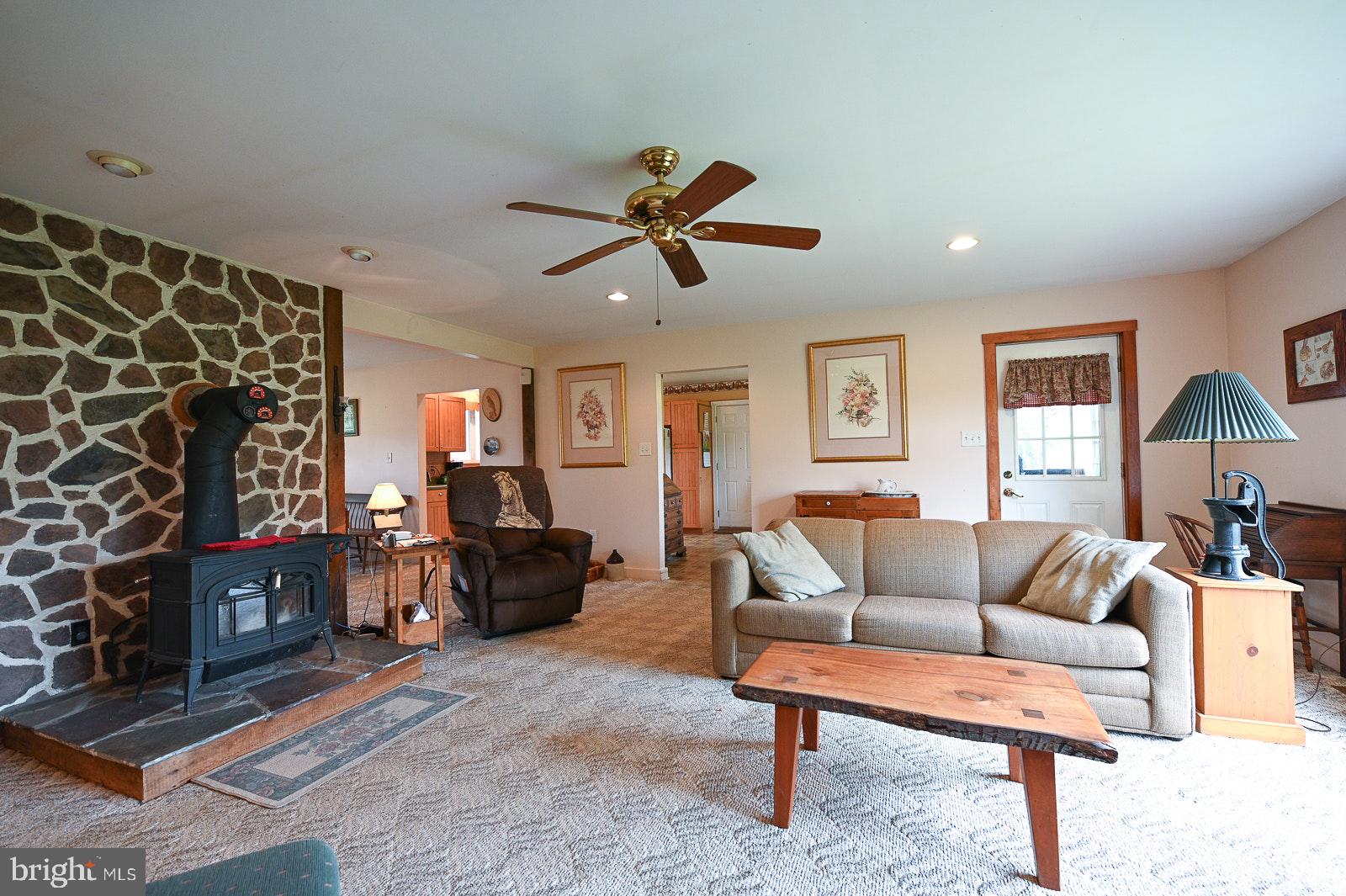 2074 Flowing Springs Road Chester Springs, PA 19425 - Photo 25 of 62 Beautiful stone wall in Family Room