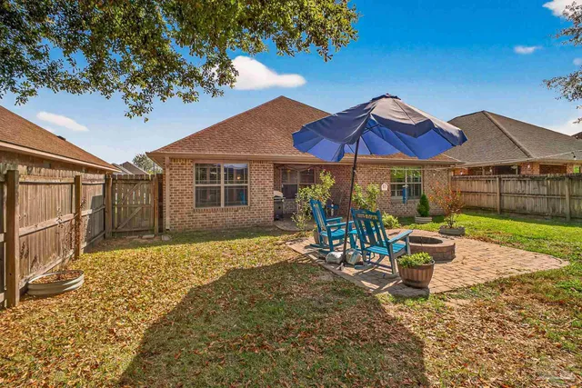 a view of a swimming pool with a patio