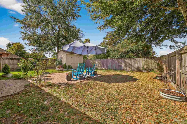 a view of a house with a patio