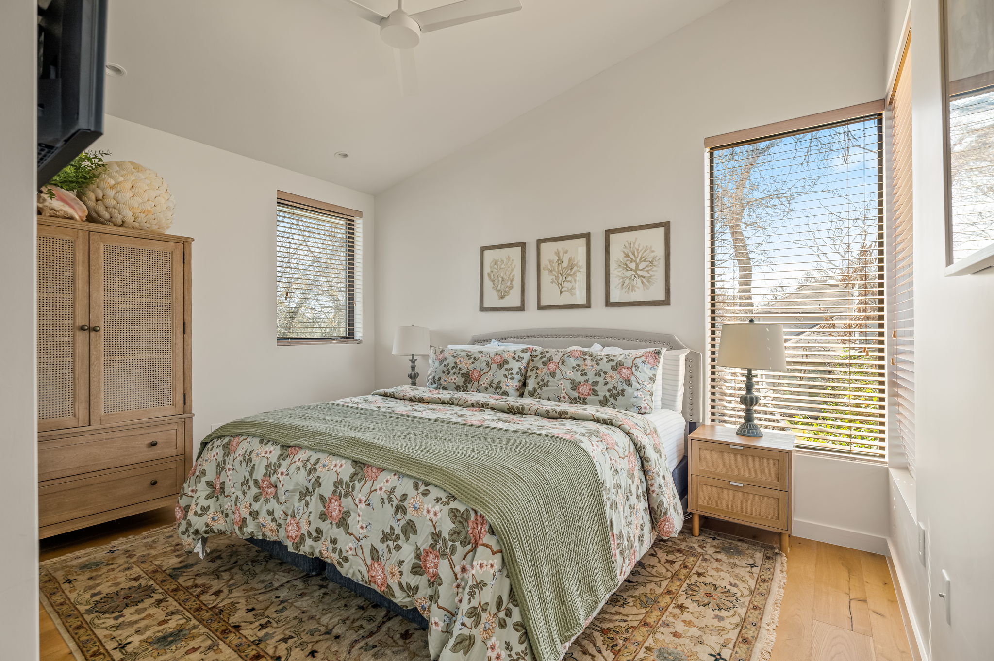 1811 Collier Street Austin, TX 78704 - Photo 29 of 40 Bedroom with light wood-type flooring, vaulted ceiling, and ceiling fan