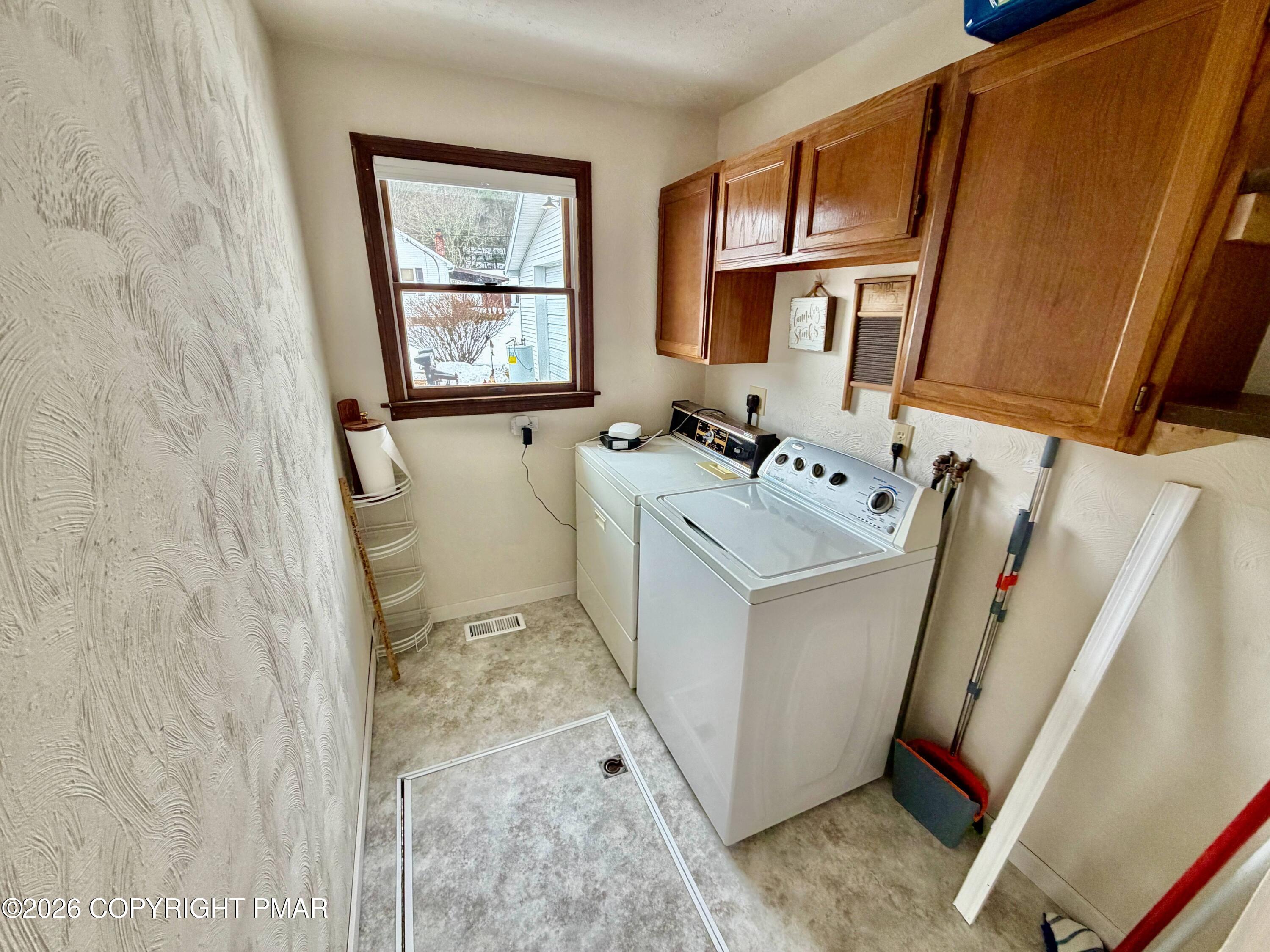 108 Rinker Drive Effort, PA 18330 - Photo 16 of 20 a utility room with dryer and washer