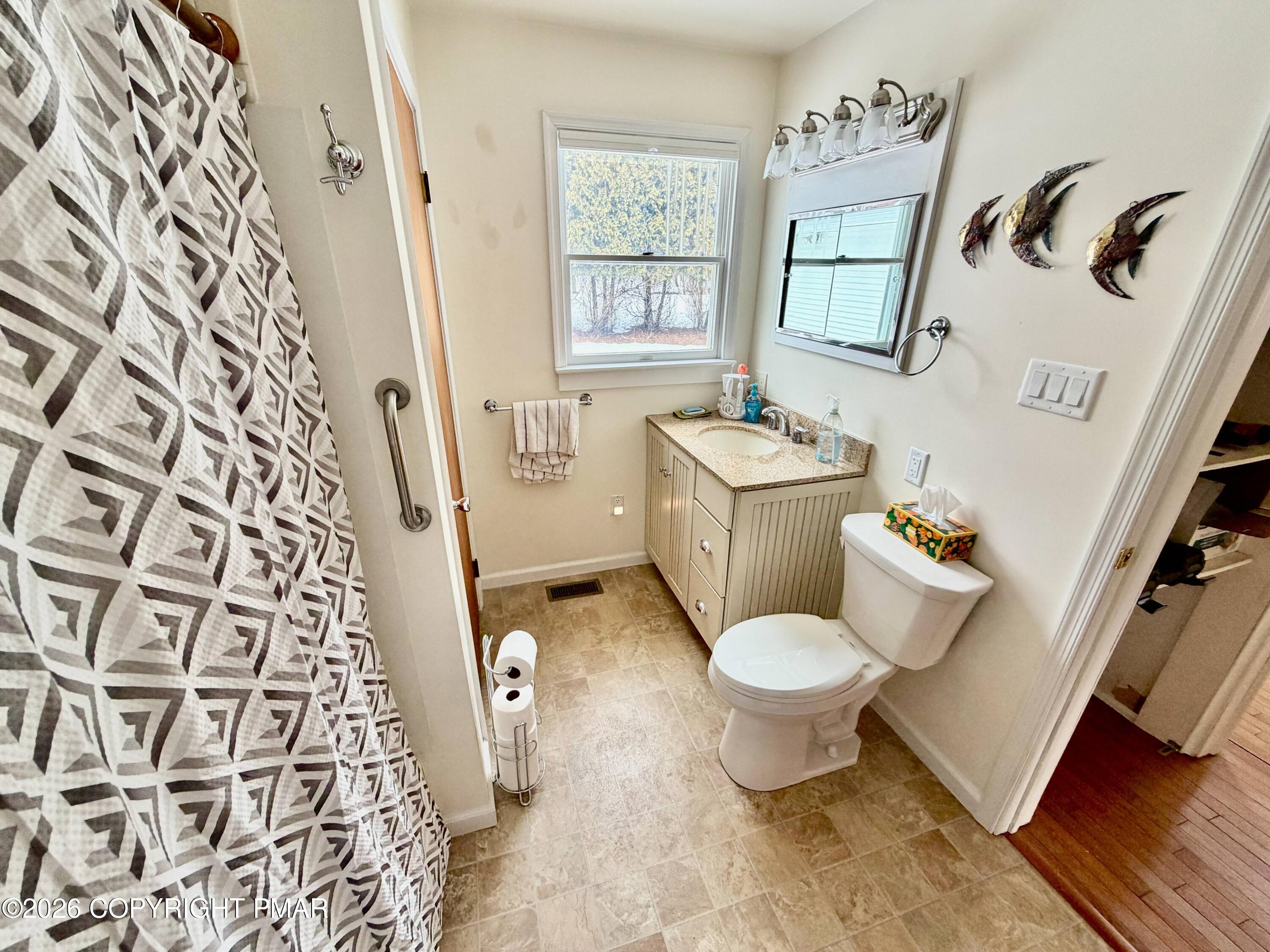 108 Rinker Drive Effort, PA 18330 - Photo 18 of 20 a bathroom with a toilet and a sink
