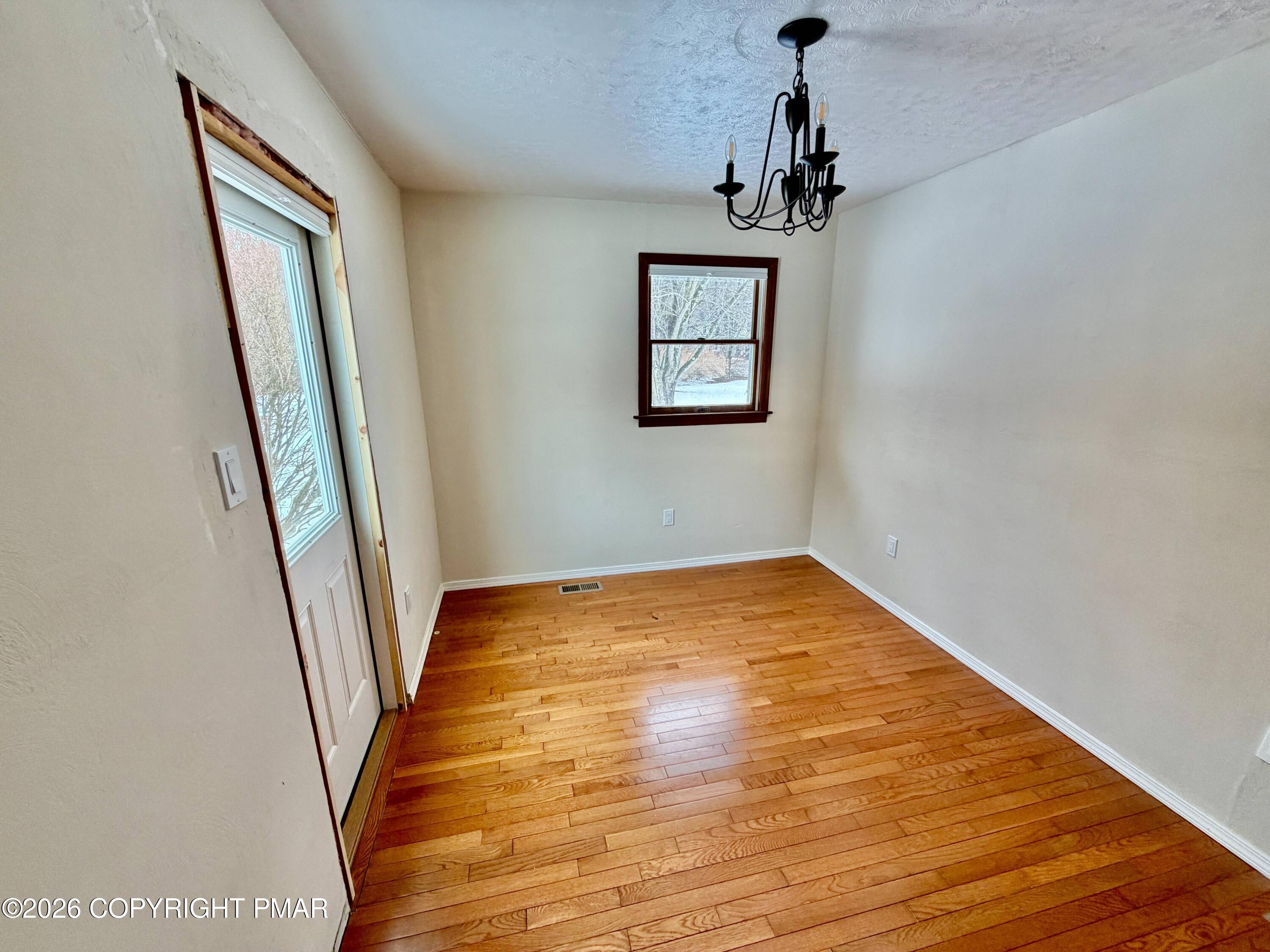 108 Rinker Drive Effort, PA 18330 - Photo 20 of 20 a view of empty room with wooden floor