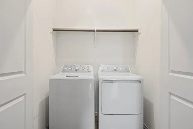 a utility room with dryer and washer