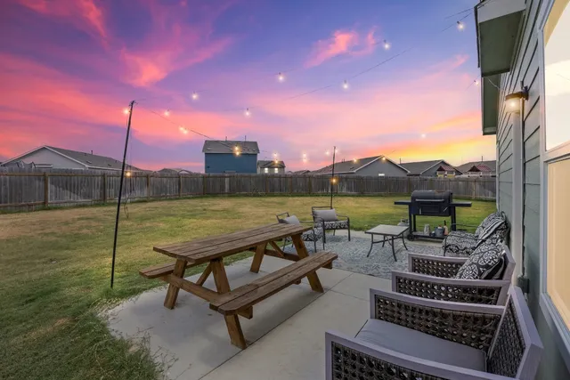 a view of a terrace with sitting area