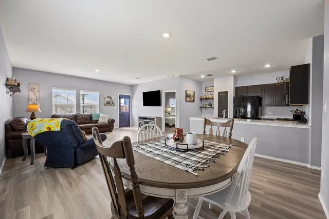 a view of a dining room with furniture