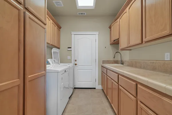 a view of a kitchen with a sink