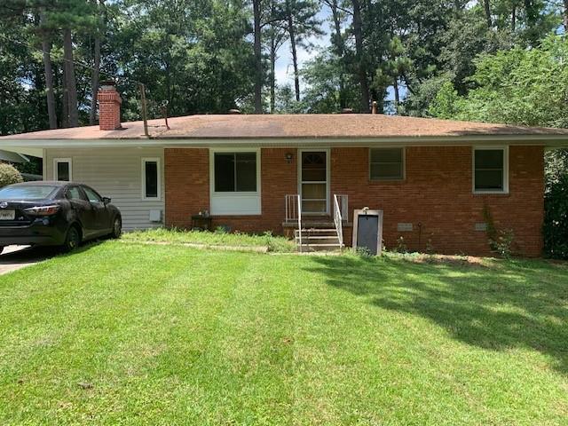 3133 Vine Circle Decatur, GA 30033 - Photo 1 of 1 a view of a house with a yard