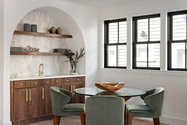 a living room with furniture and window