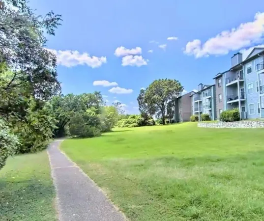a view of a building with garden