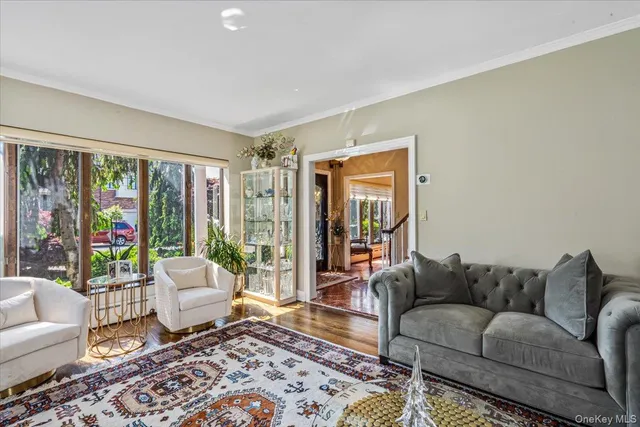 a living room with furniture and a rug