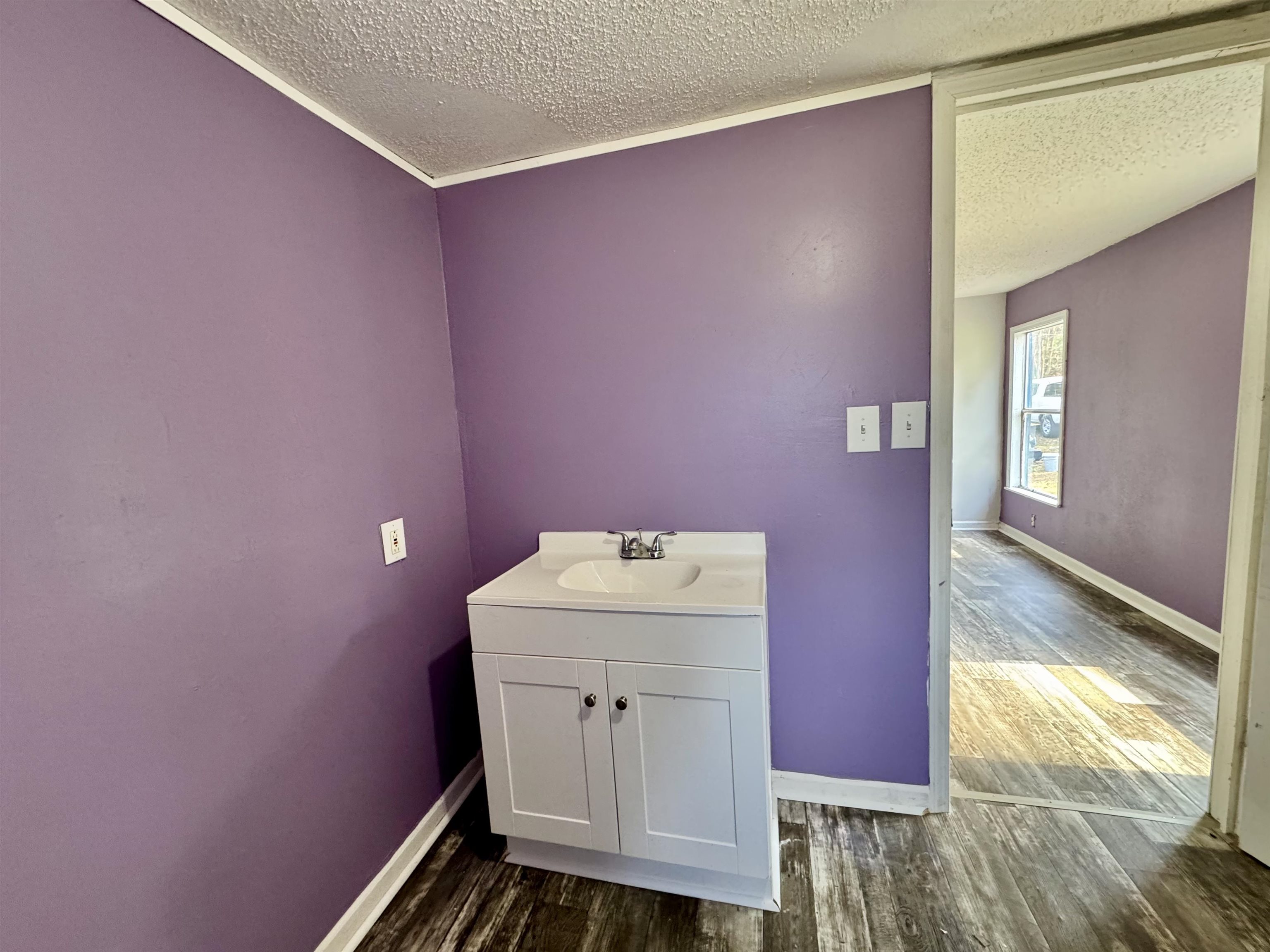 855 Beason Drive Morris Chapel, TN 38361 - Photo 15 of 21 a bathroom with a sink a toilet and mirror