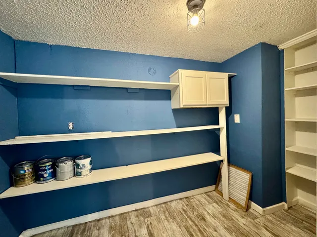 a room with a book shelf