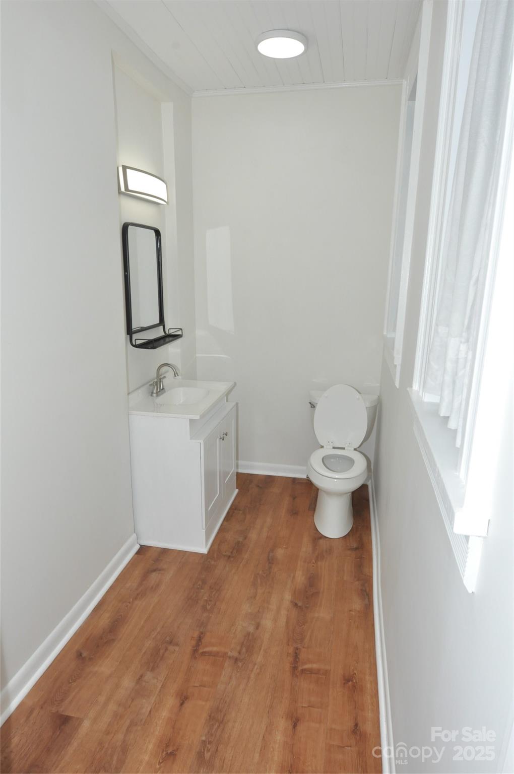 152 Saluda Street Chester, SC 29706 - Photo 15 of 24 a bathroom with a toilet sink and mirror