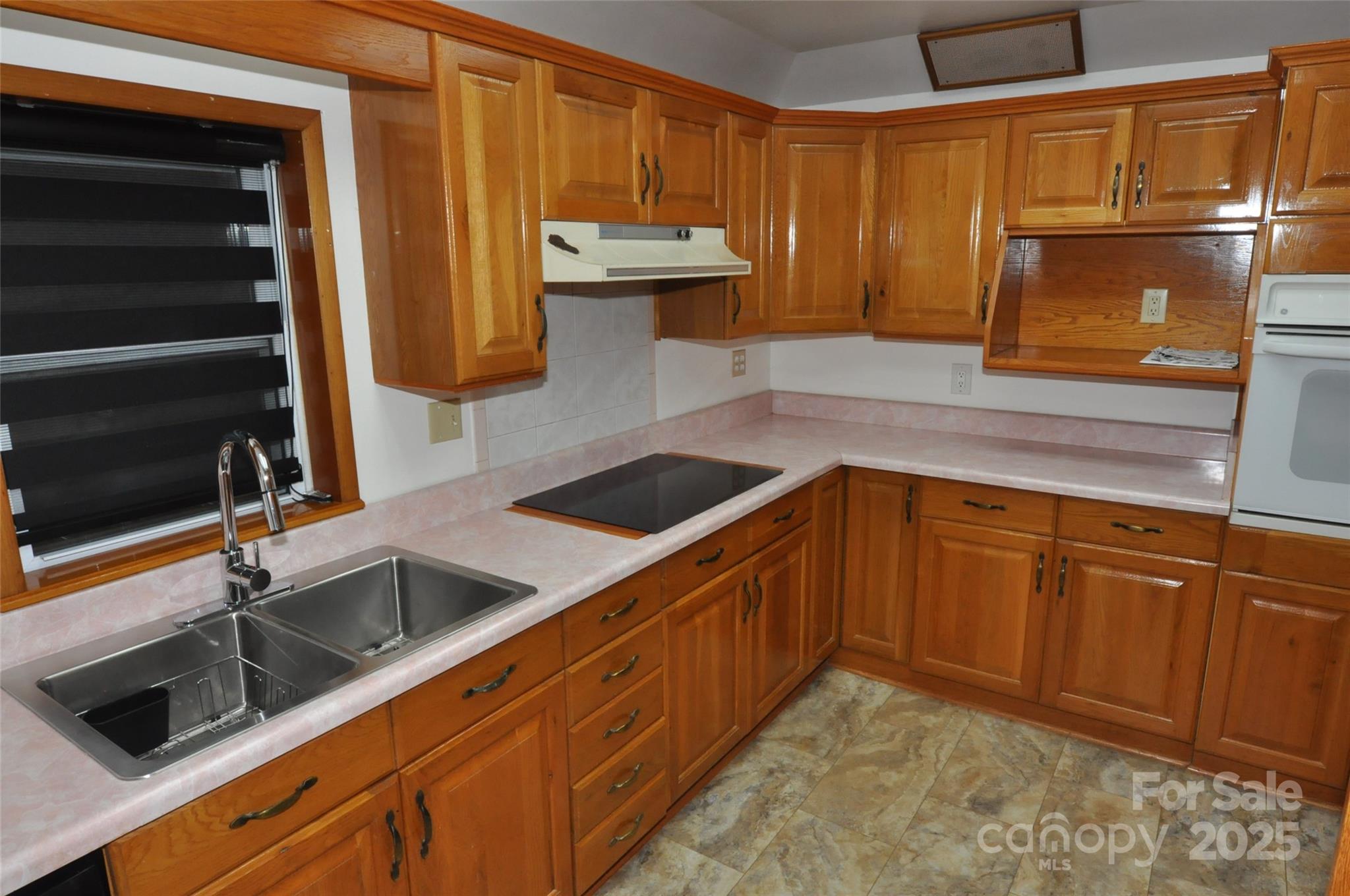 152 Saluda Street Chester, SC 29706 - Photo 20 of 24 a kitchen with a sink and cabinets