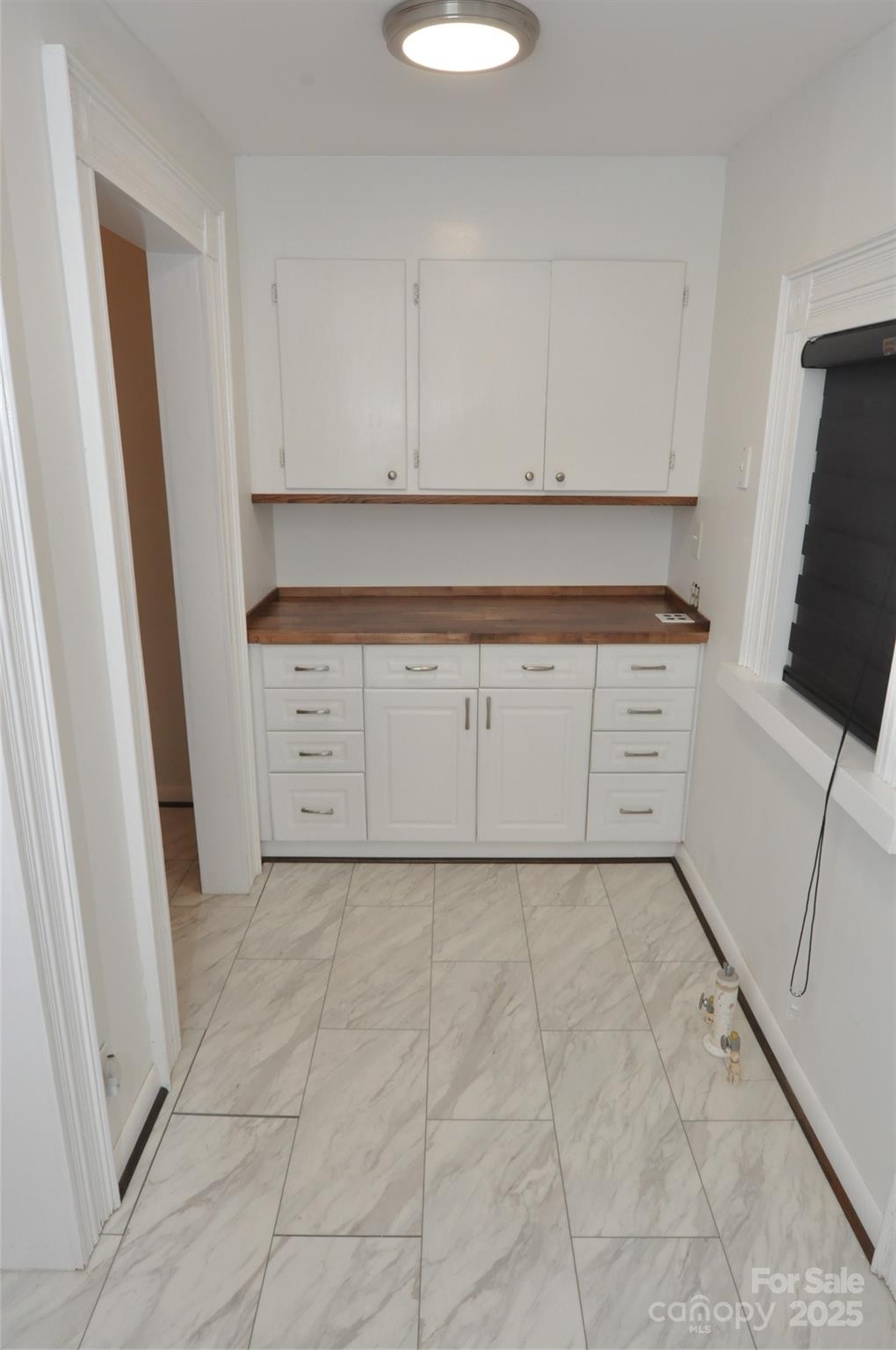 152 Saluda Street Chester, SC 29706 - Photo 22 of 24 a view of kitchen with white cabinets