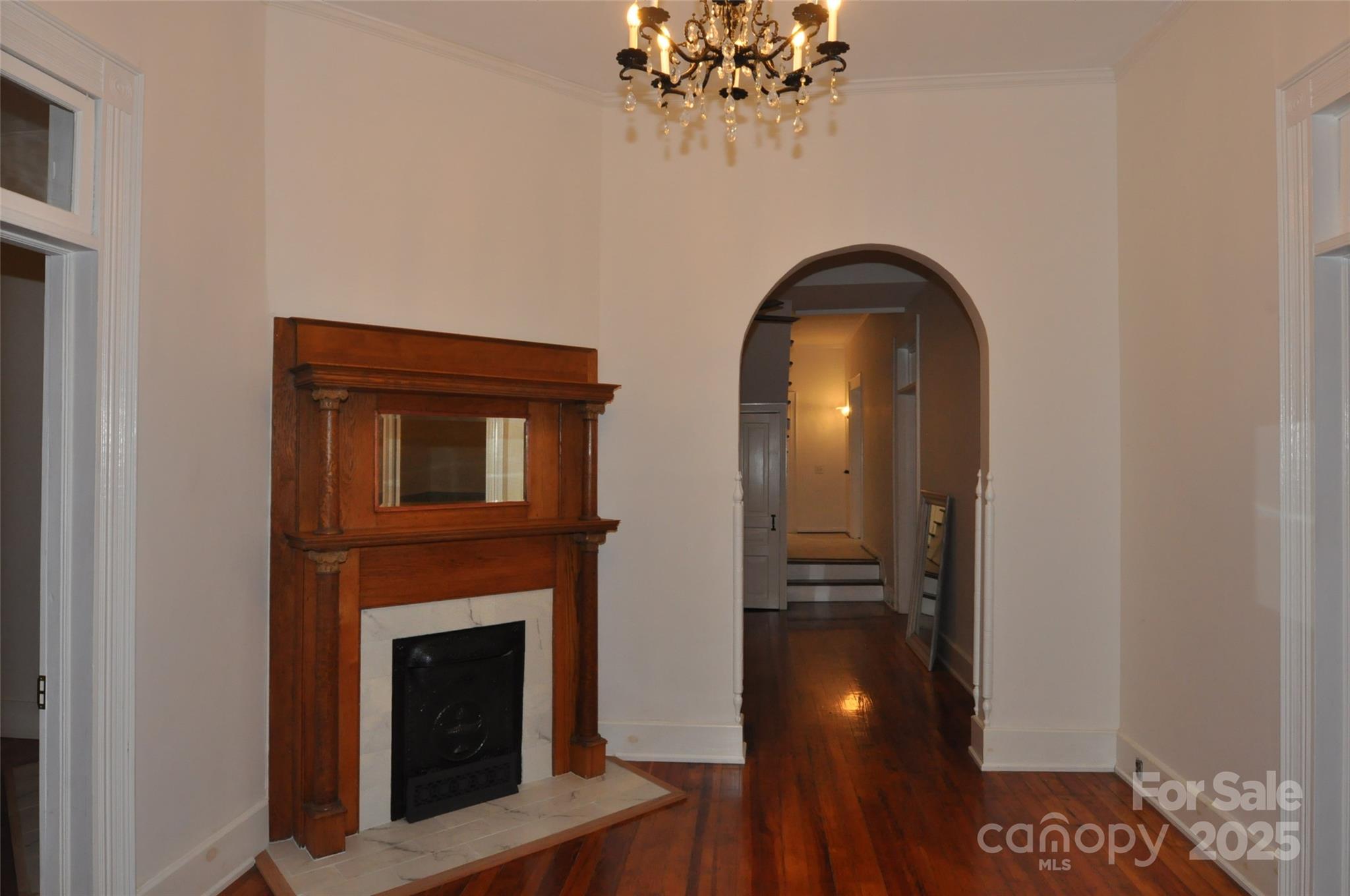 152 Saluda Street Chester, SC 29706 - Photo 5 of 24 a view of entryway with a chandelier