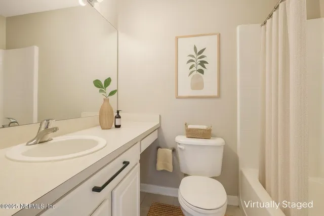 a view of a patio with table and chairs and potted plants