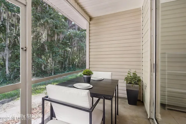 a view of a street with houses on both side