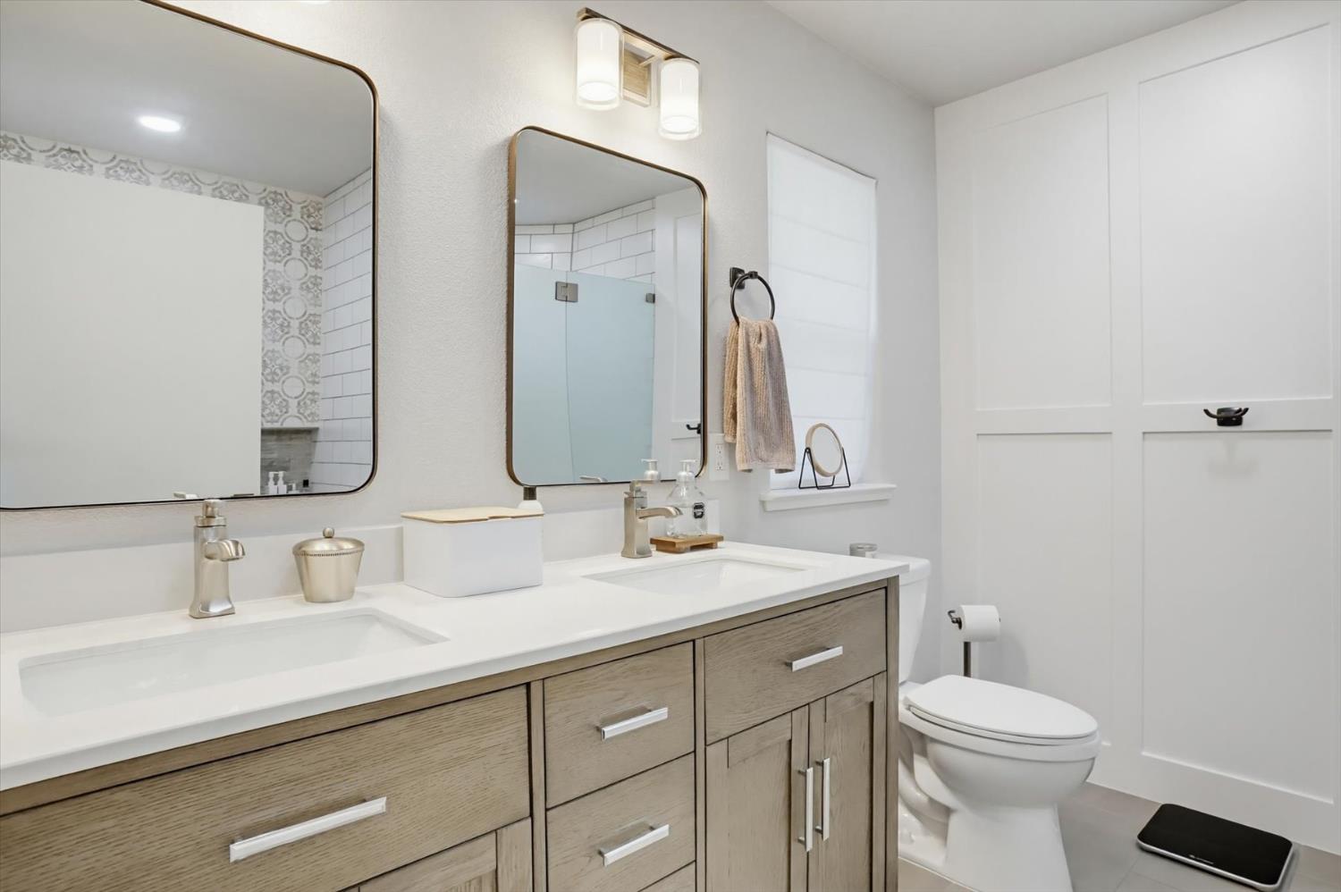 18639 Fay Ridge Court Grass Valley, CA 95949 - Photo 31 of 99 a bathroom with a sink a toilet and a mirror