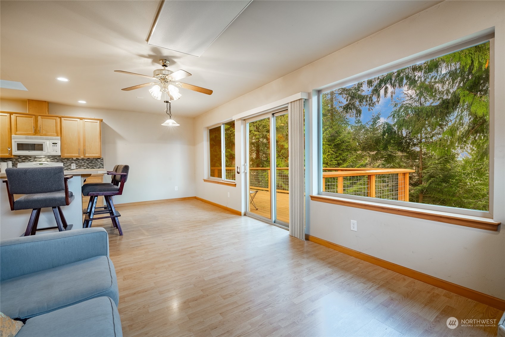 2940 Cedar Avenue Lummi Island, WA 98262 - Photo 14 of 36 a view of livingroom with furniture window and wooden floor