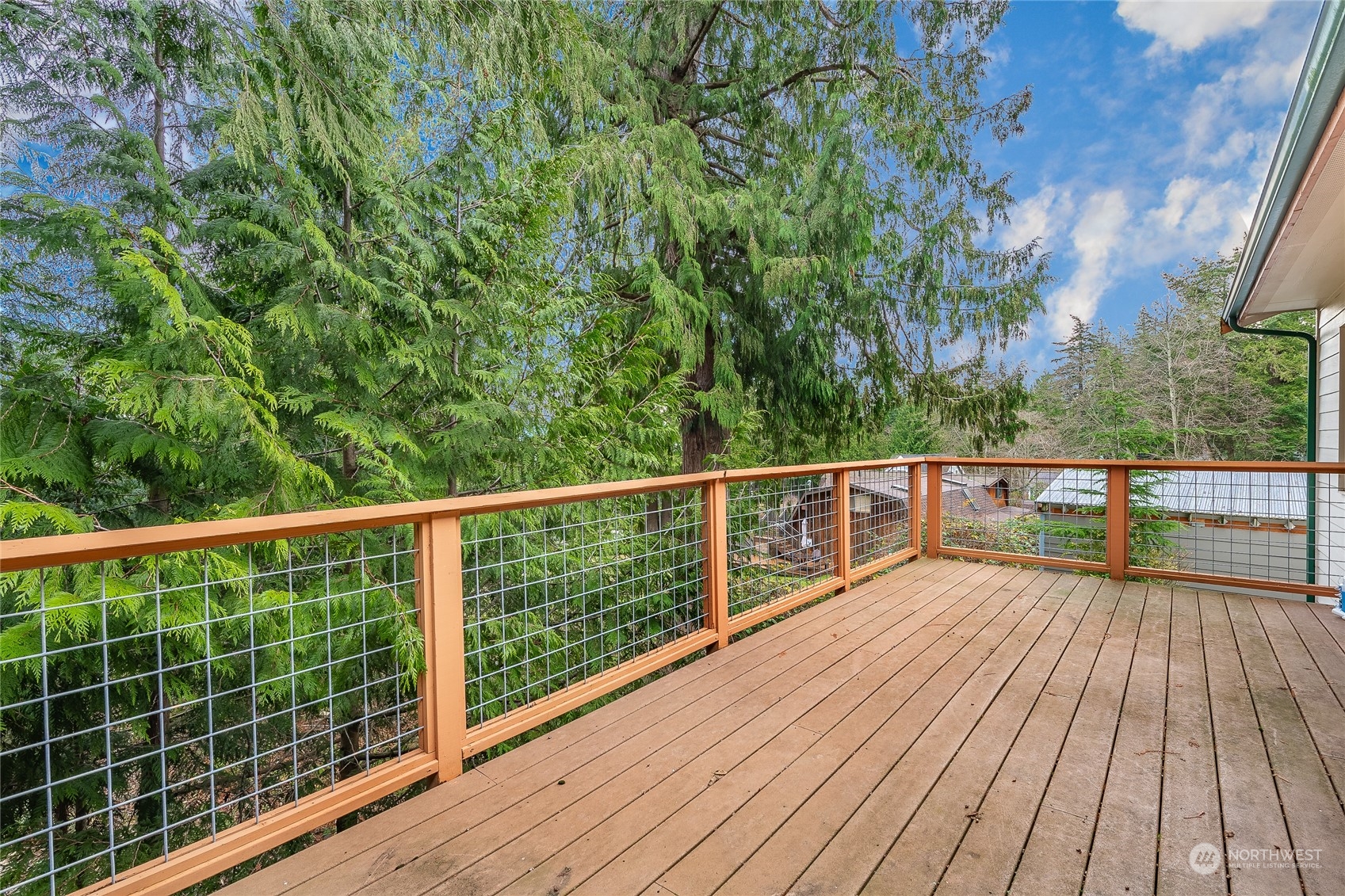 2940 Cedar Avenue Lummi Island, WA 98262 - Photo 24 of 36 a view of a balcony with wooden floor