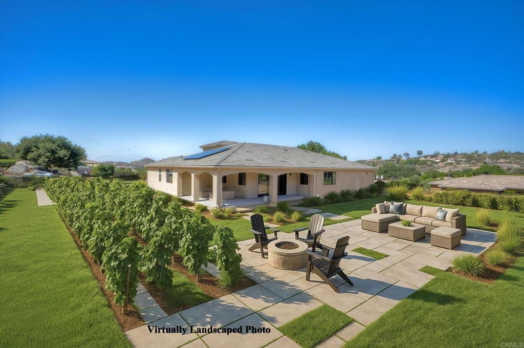 12073 Via Trevi, Unit LOT 2 Lakeside, CA 92040 - Photo 4 of 33 a front view of a house with garden