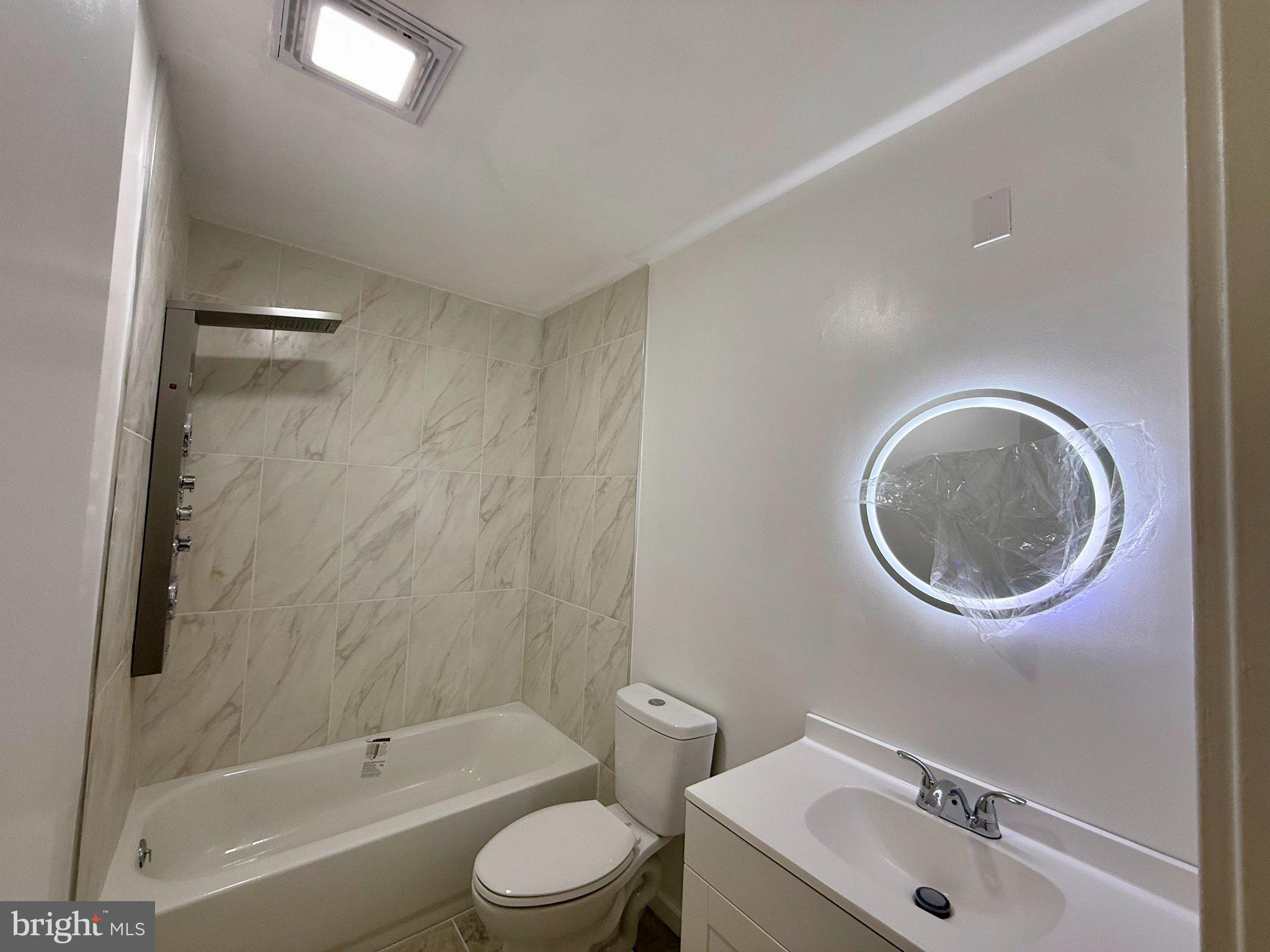 1502 Bromley Estate Pine Hill, NJ 08021 - Photo 19 of 33 Sleek modern bathroom with elegant finishes.