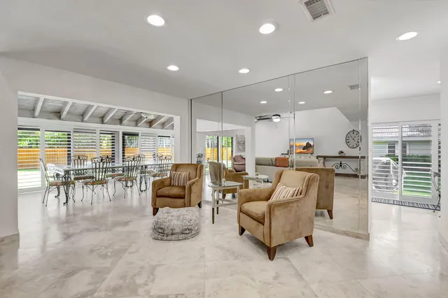 a living room with furniture and a table