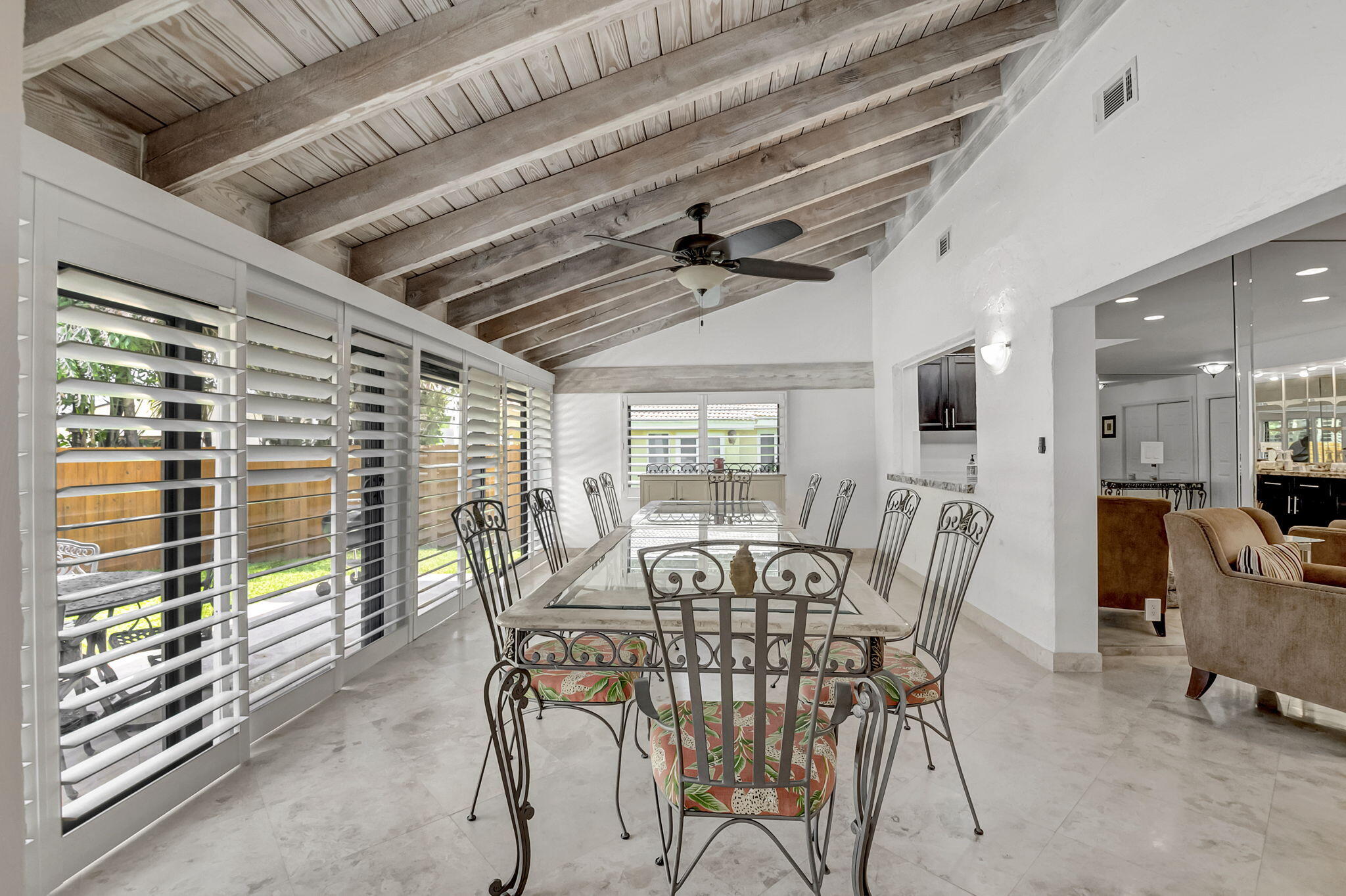 804 Foxpointe Circle Delray Beach, FL 33445 - Photo 14 of 43 a view of a dining room with furniture window and outside view