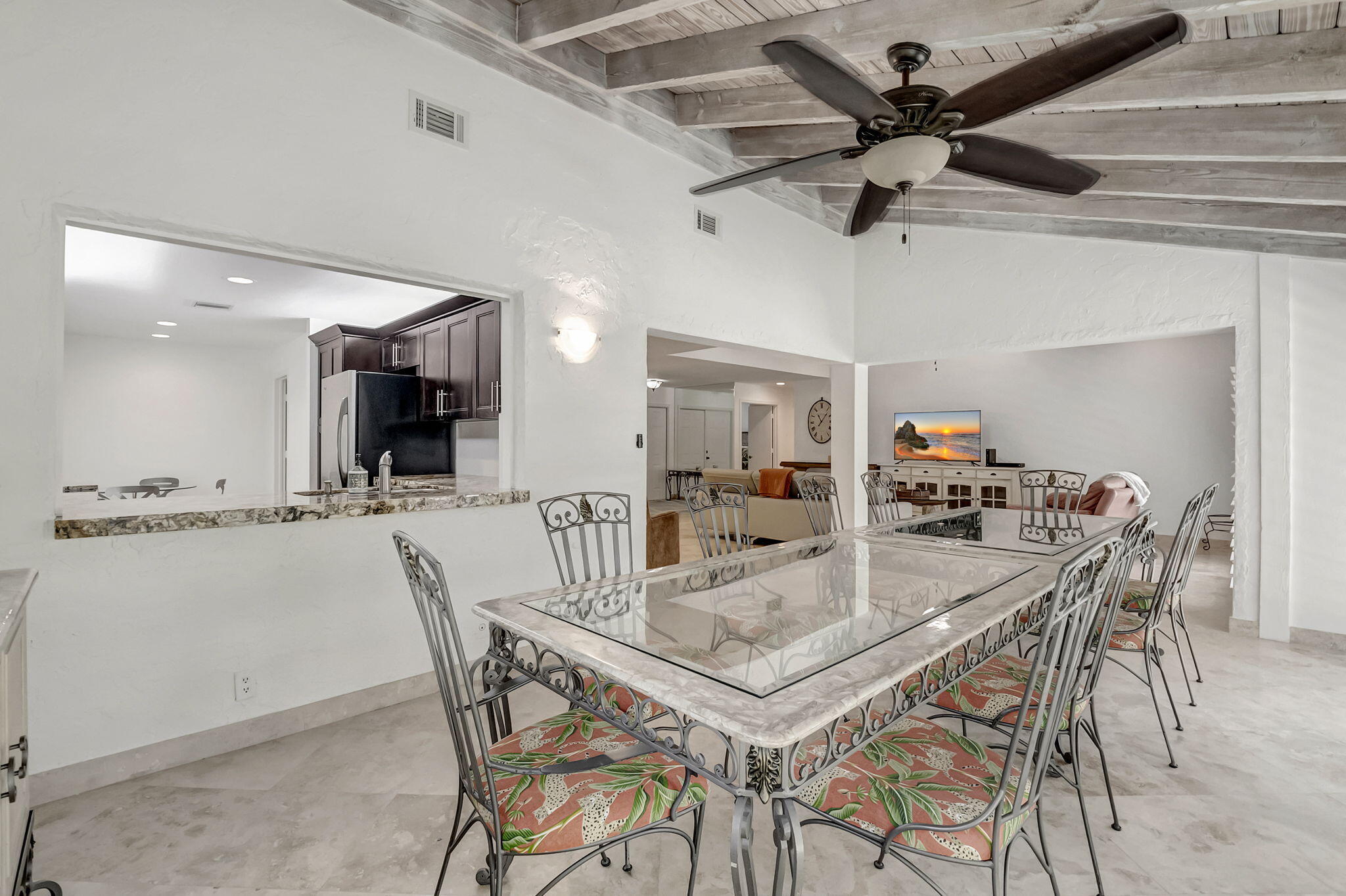 804 Foxpointe Circle Delray Beach, FL 33445 - Photo 15 of 43 a dining room with a table and chairs