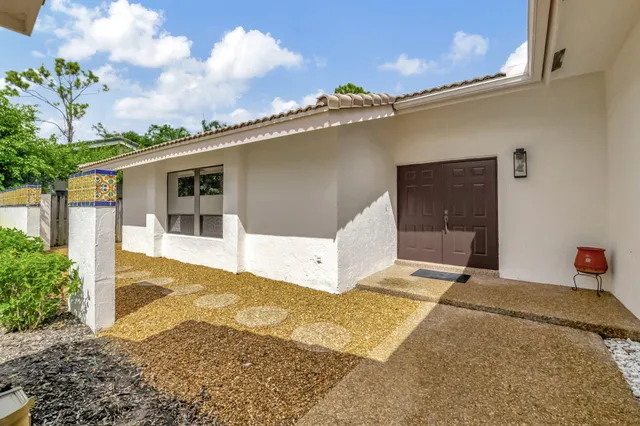 a spacious bathroom with a tub and shower