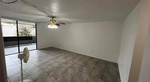 en empty room with windows