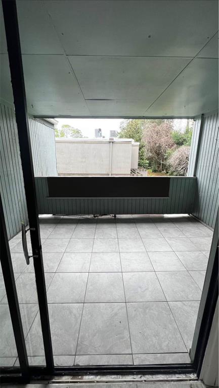 707 Southwest 75th Street, Unit 109 Gainesville, FL 32607 - Photo 9 of 13 a view of a glass door