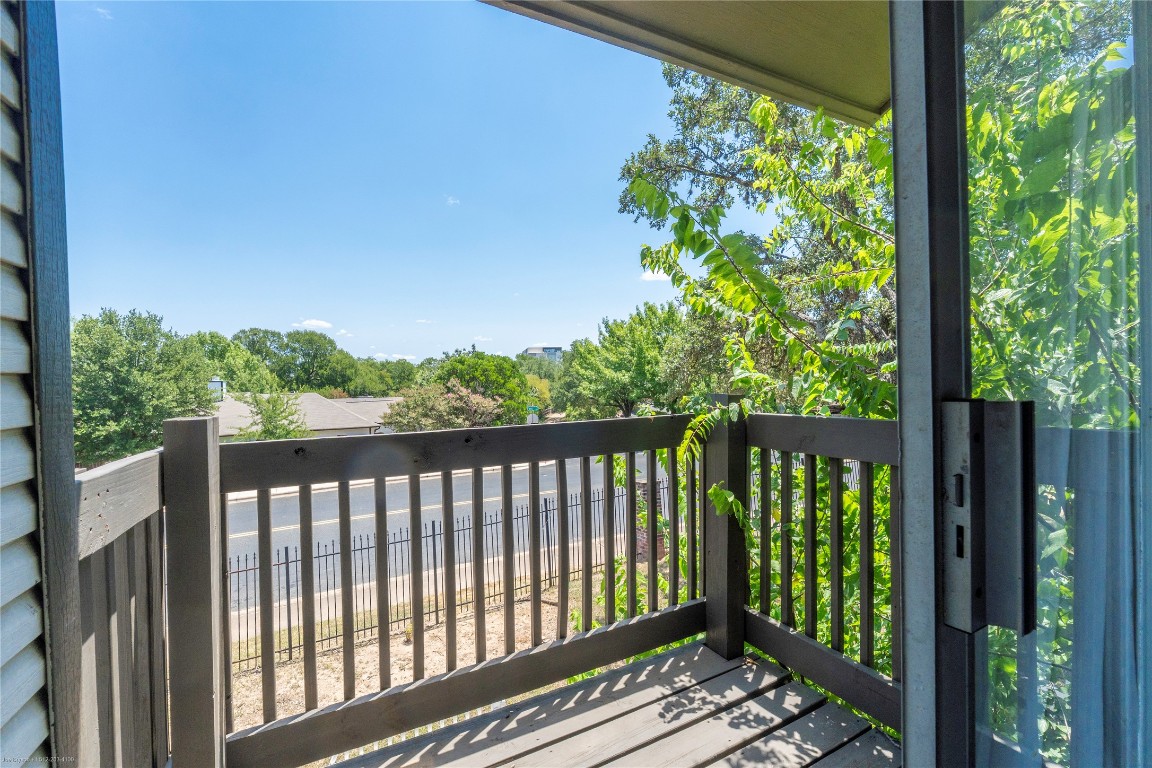 1845 River Crossing Circle, Unit C Austin, TX 78741 - Photo 20 of 28 a balcony with street view