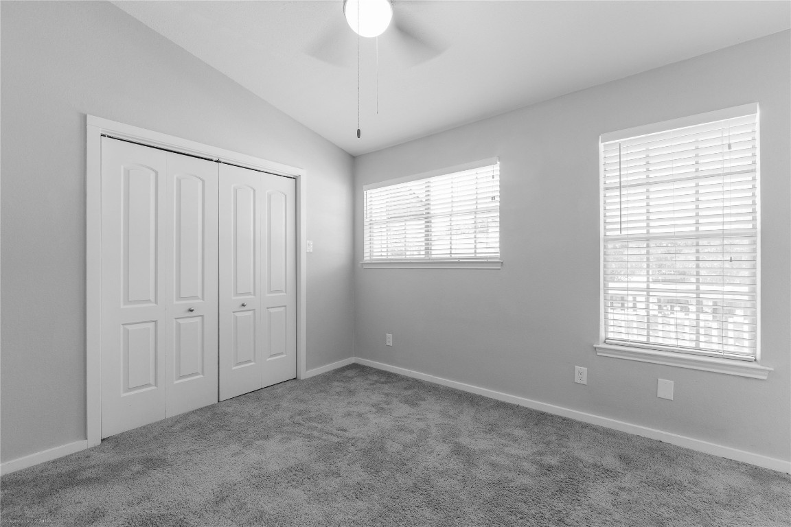 1845 River Crossing Circle, Unit C Austin, TX 78741 - Photo 8 of 28 a view of an empty room with a window