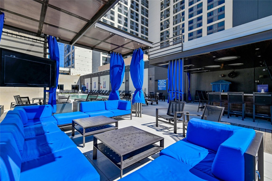 555 East 5th Street, Unit 2721 Austin, TX 78701 - Photo 15 of 33 a outdoor living space with furniture and a fireplace