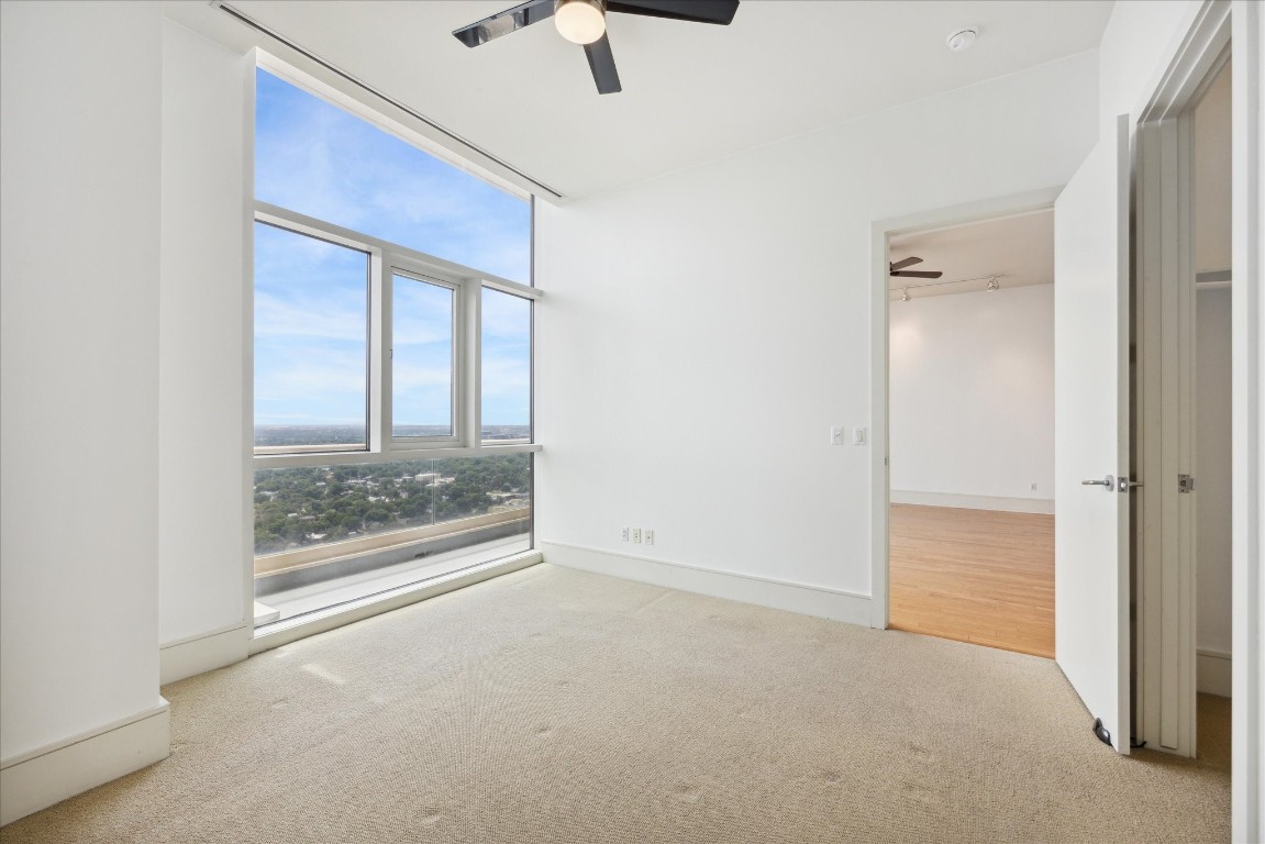 555 East 5th Street, Unit 2721 Austin, TX 78701 - Photo 29 of 33 an empty room with windows