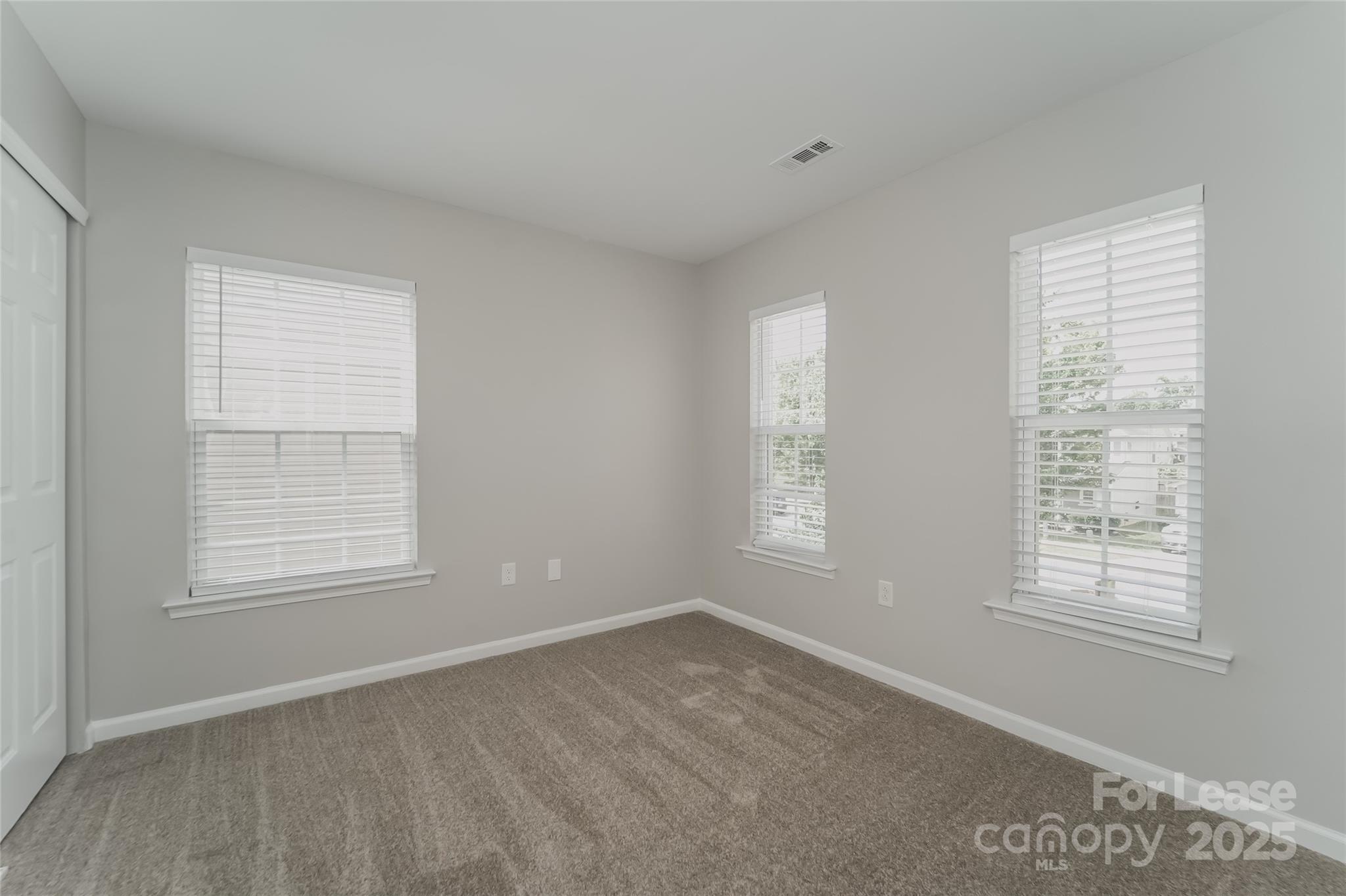 4416 Marys Point Road Monroe, NC 28110 - Photo 4 of 12 a view of an empty room with a window